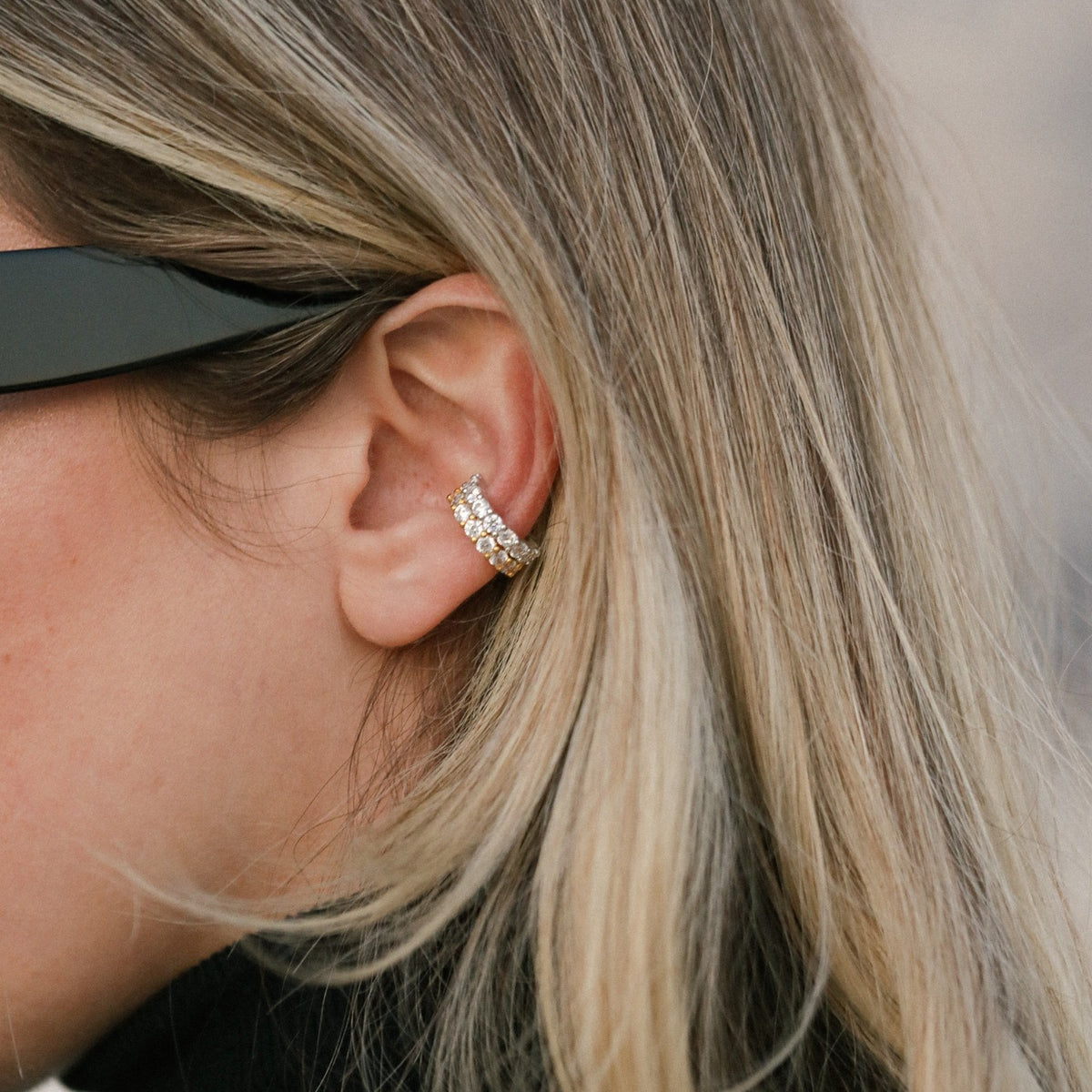 Charlotte Ear Cuff styled on ear in a close-up editorial photo