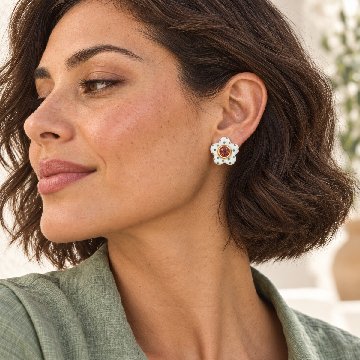 Close-up of Siena Bloom Studs worn on ear