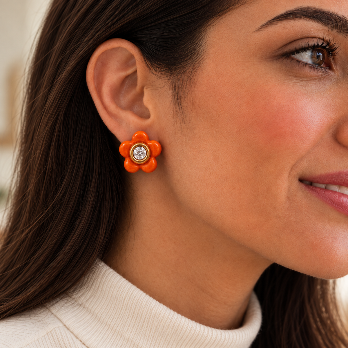 Close-up of Valencia Bloom Studs worn on ear